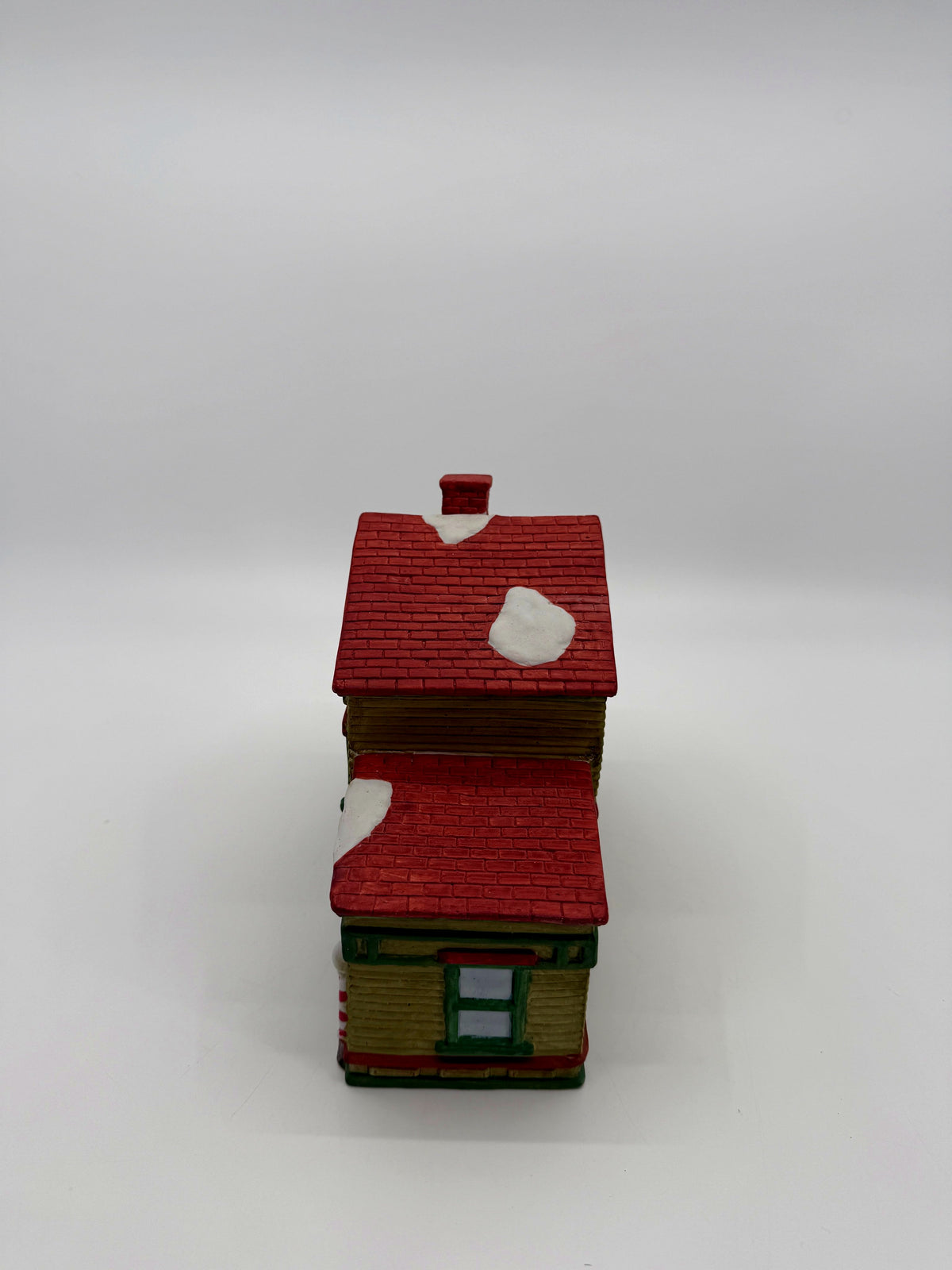 Side view - barber shop wing with striped barber pole