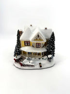Victorian Homestead - front view with snowy yard and lampposts