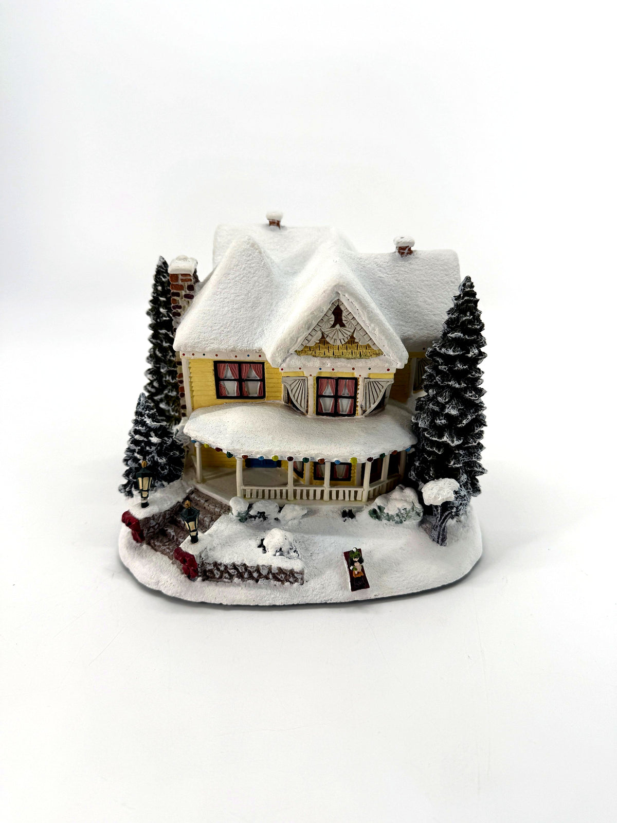 Victorian Homestead - front view with snowy yard and lampposts