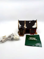 Department 56 Dickens' Village Butter Tub Barn #58338 – the building with its original light cord still sealed in packaging and the Heritage Village Collection literature booklet