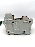 Department 56 Dickens' Village Butter Tub Barn #58338 – underside full view: molded Dickens' Village Series Butter Tub Barn mark, 1996, Made in China inspection sticker