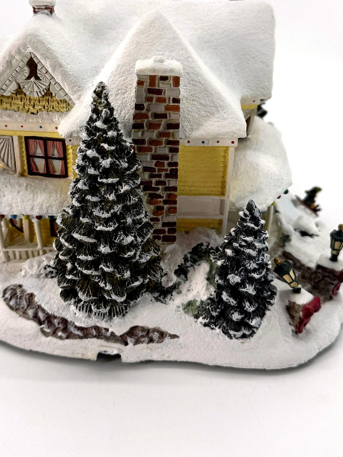 Victorian Homestead - stone chimney and evergreen detail