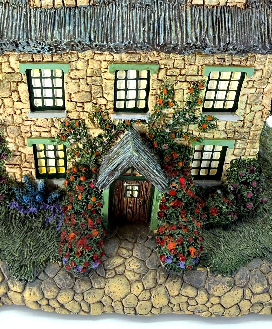 Detail - Stonebrooke Inn stone facade, roses and front door