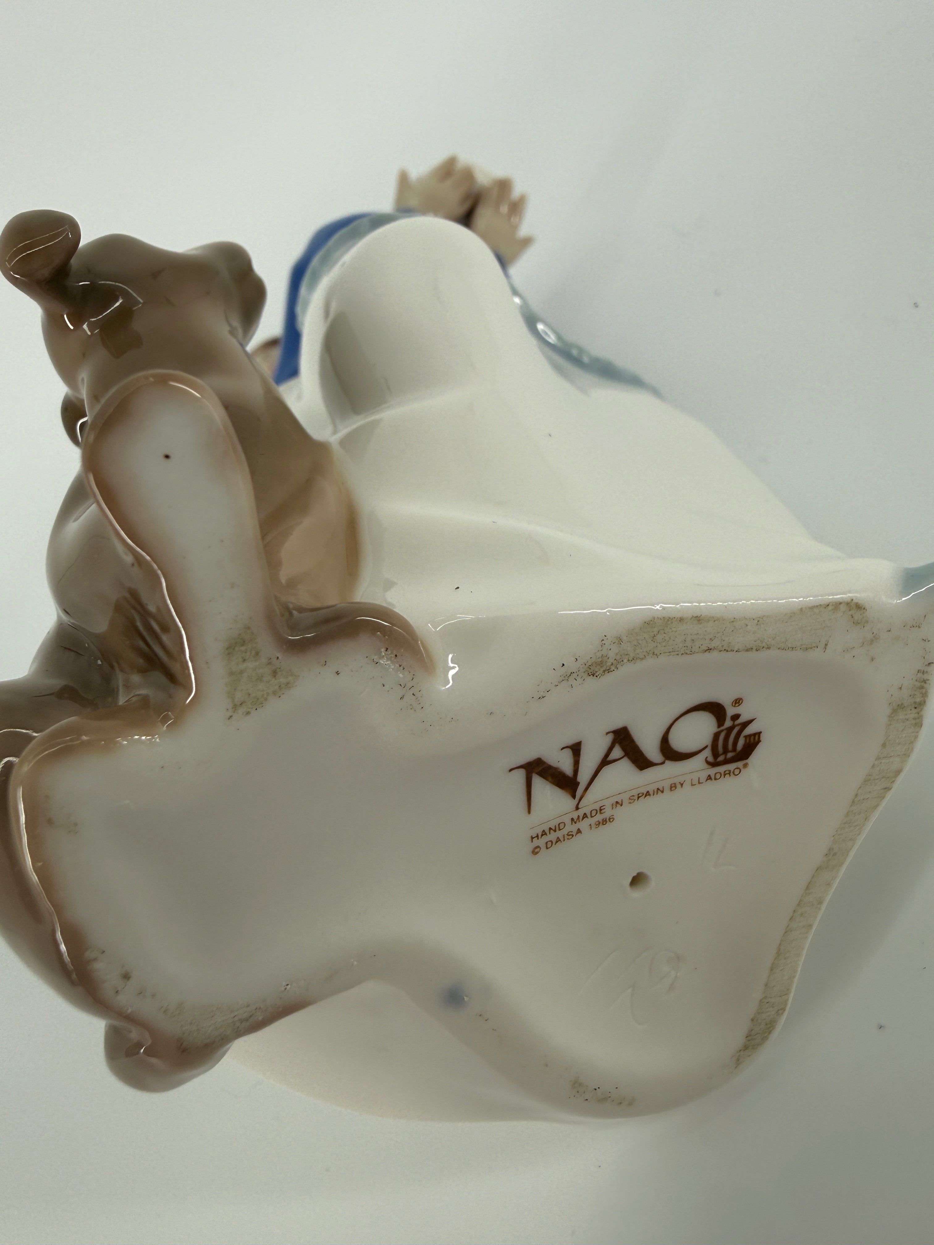 NAO by Lladró “Puppy’s Birthday” #1045 Porcelain Figurine – 7.5"