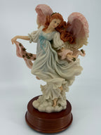 1997 Seraphim Classics Ariel "Heaven's Shining Star" Figurine Music Box