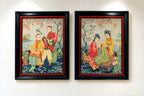 Styled wall view of both vintage framed Asian figural textile artworks together