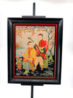 Vintage Asian figural textile art — signed framed pair — the musicians panel on a stand, front view