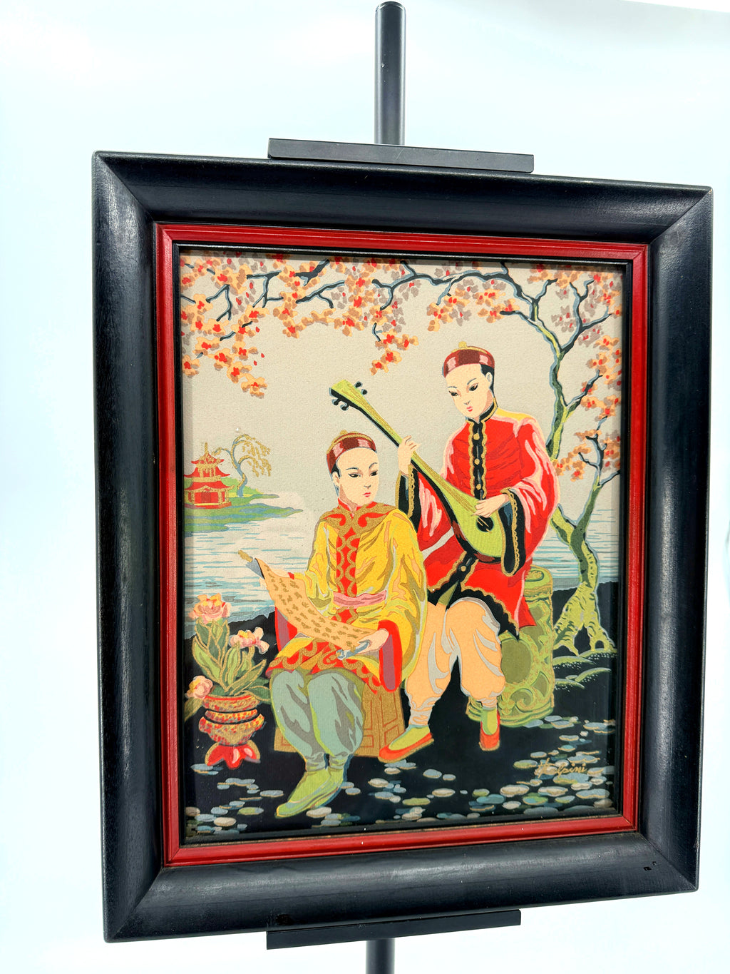 Vintage Asian figural textile art — signed framed pair — the musicians panel, front view