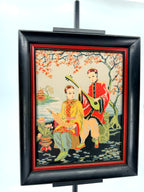 Vintage Asian figural textile art — signed framed pair — the musicians panel, front view