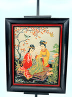 Vintage Asian figural textile art — signed framed pair — the two-women panel on a stand, front view