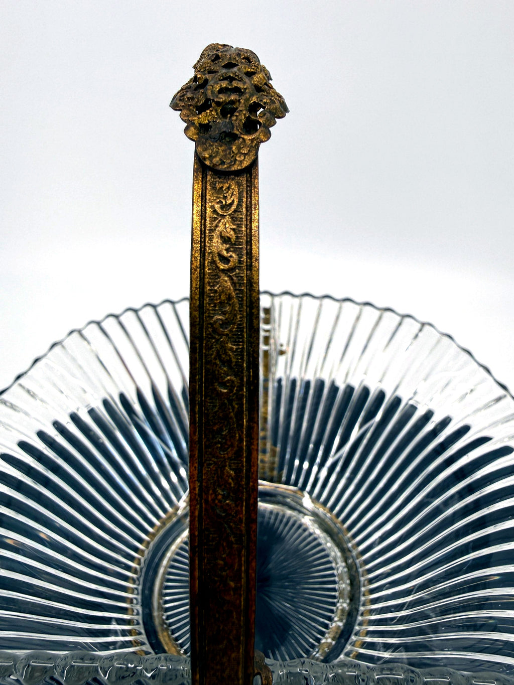 Close-up: engraved handle and pierced filigree grip (enhanced)