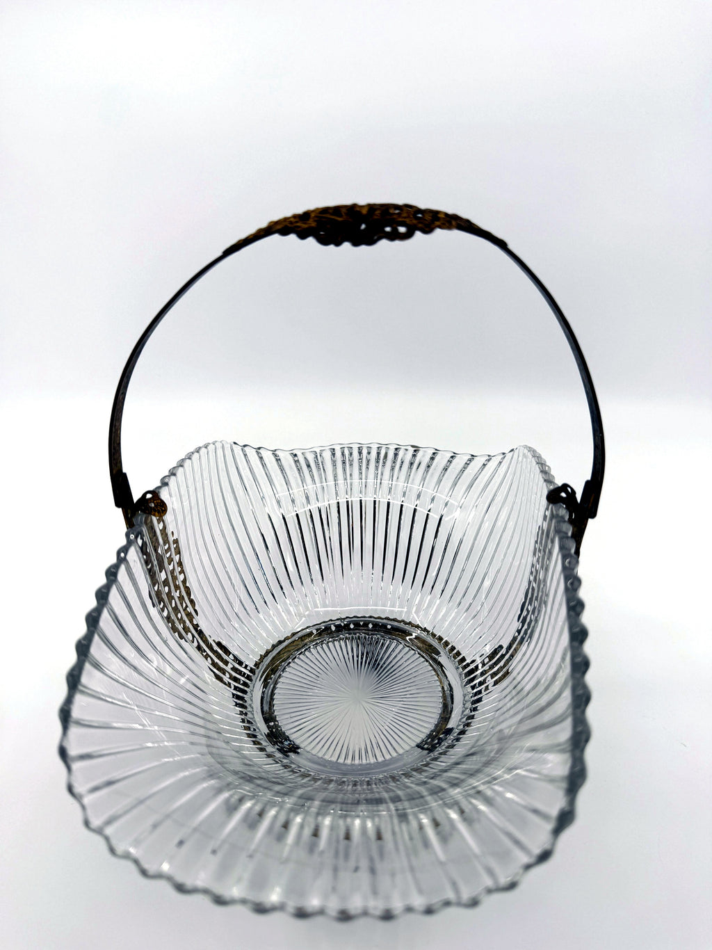 View into the bowl: ribbed glass and molded starburst base (enhanced)