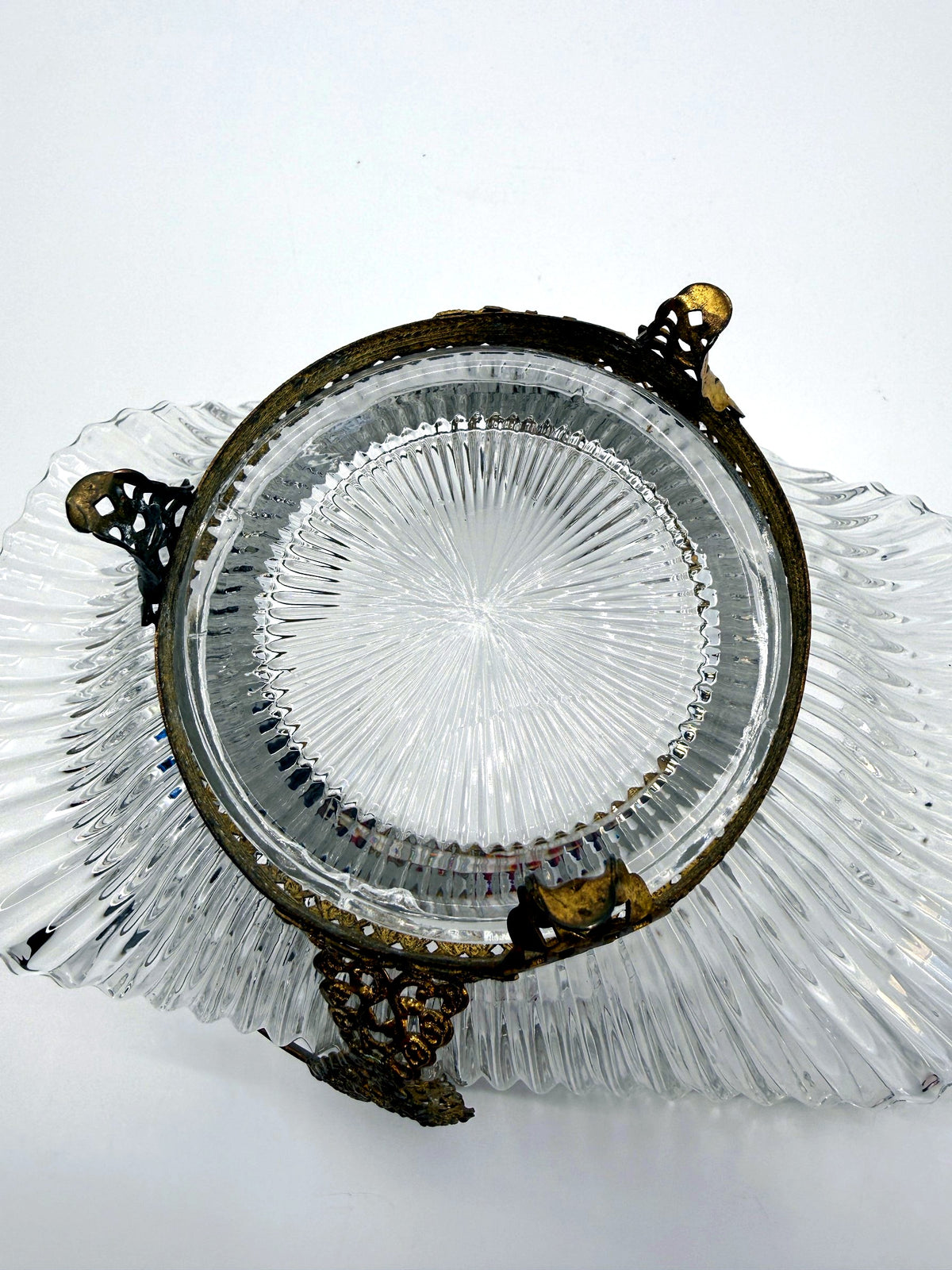Bottom view: glass base with starburst pattern (enhanced)