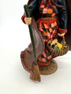 Befana front close view, broom, patchwork dress and basket (enhanced)