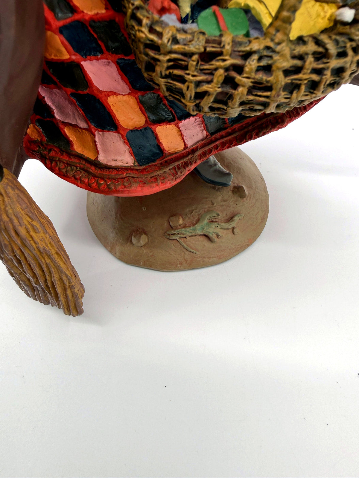 Befana base close view with sculpted lizard detail (enhanced)