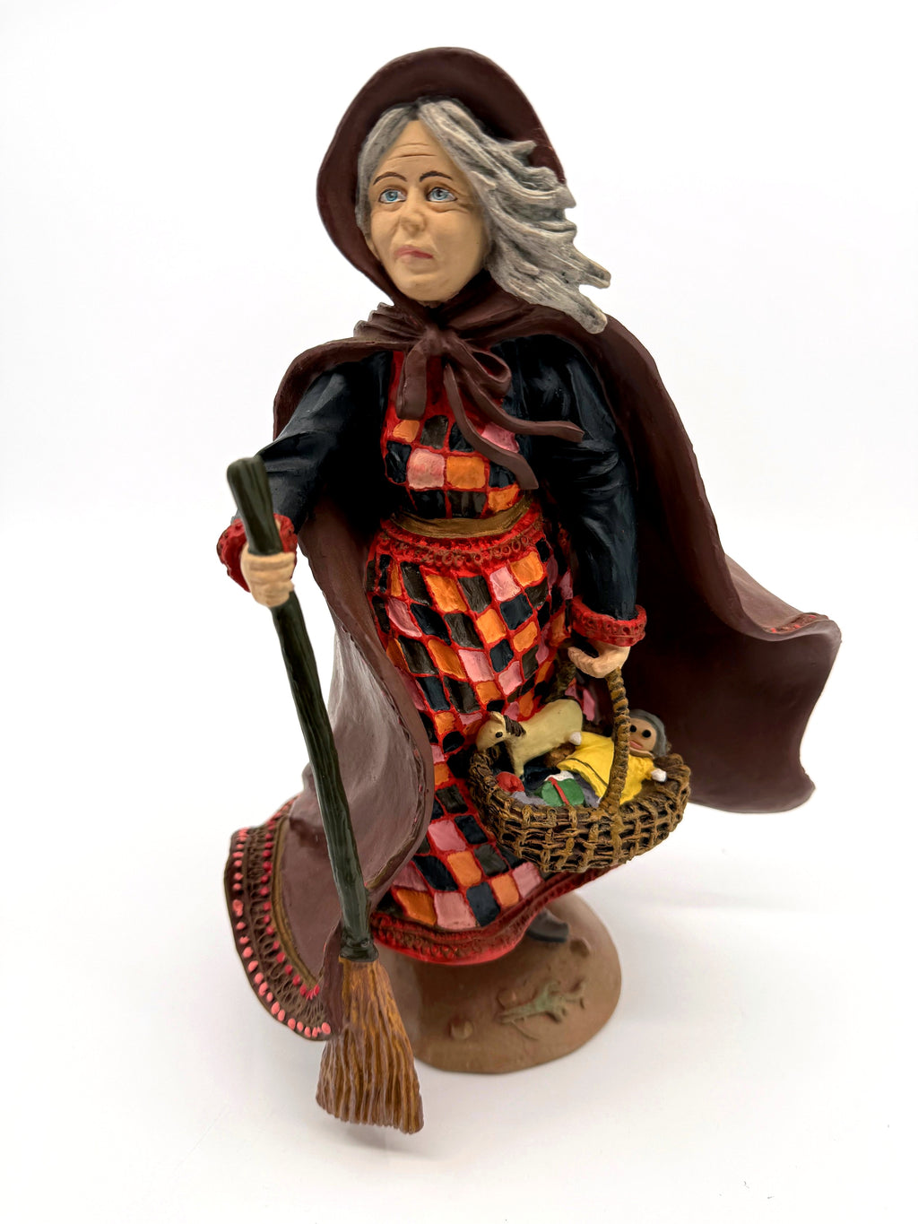 Duncan Royale Befana 1985, front three-quarter view, broom and toy basket (enhanced)