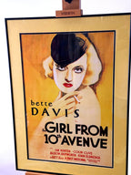 Framed Bette Davis movie poster front view with black frame and gold-toned matting