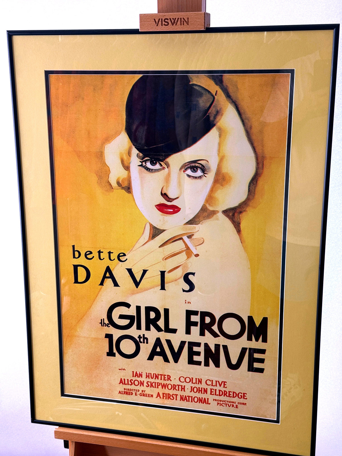 Bette Davis framed poster on easel, full front view