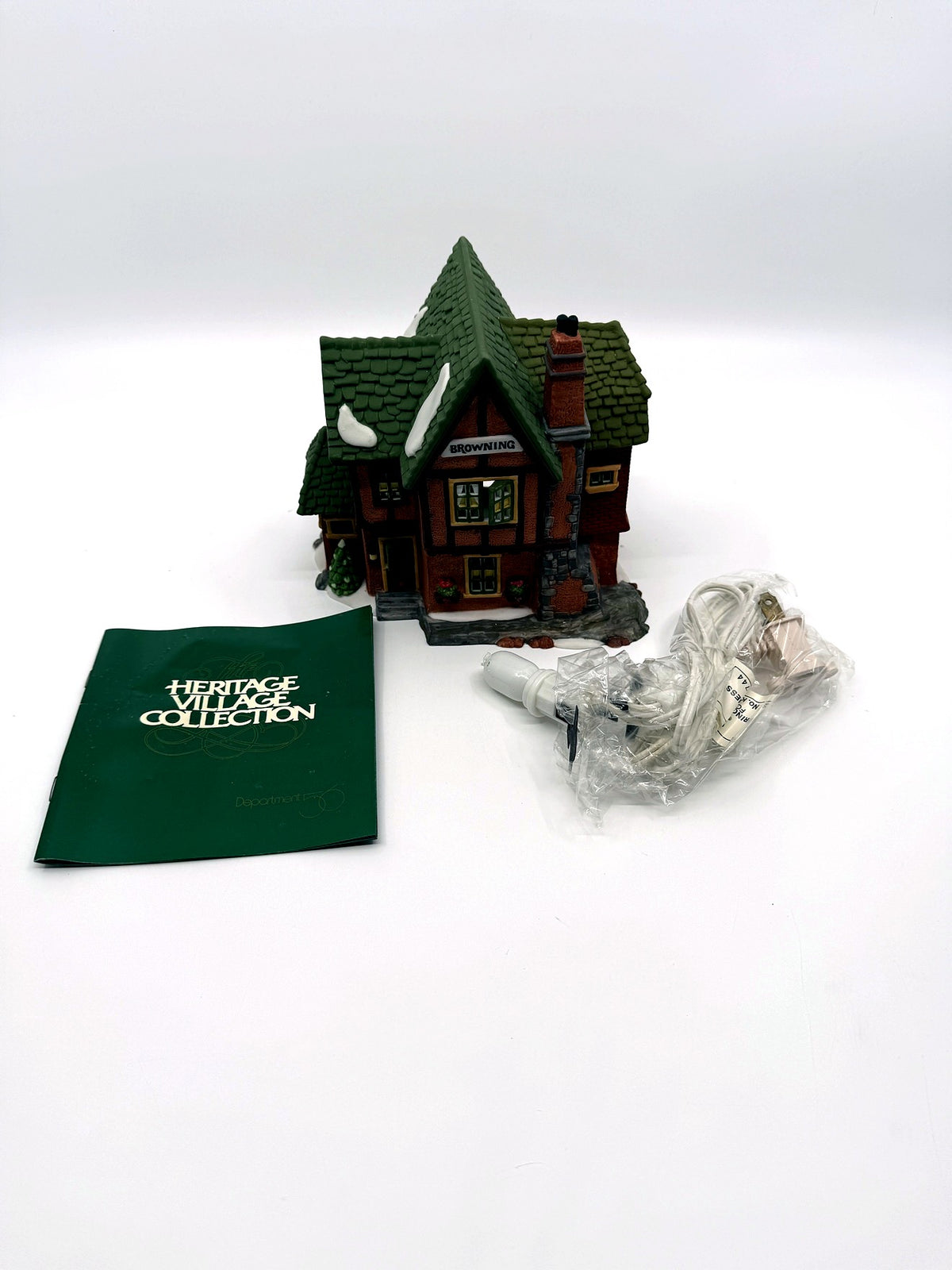 Department 56 Browning Cottage, Dickens' Village, 1994 – shown with its Heritage Village Collection booklet and light cord