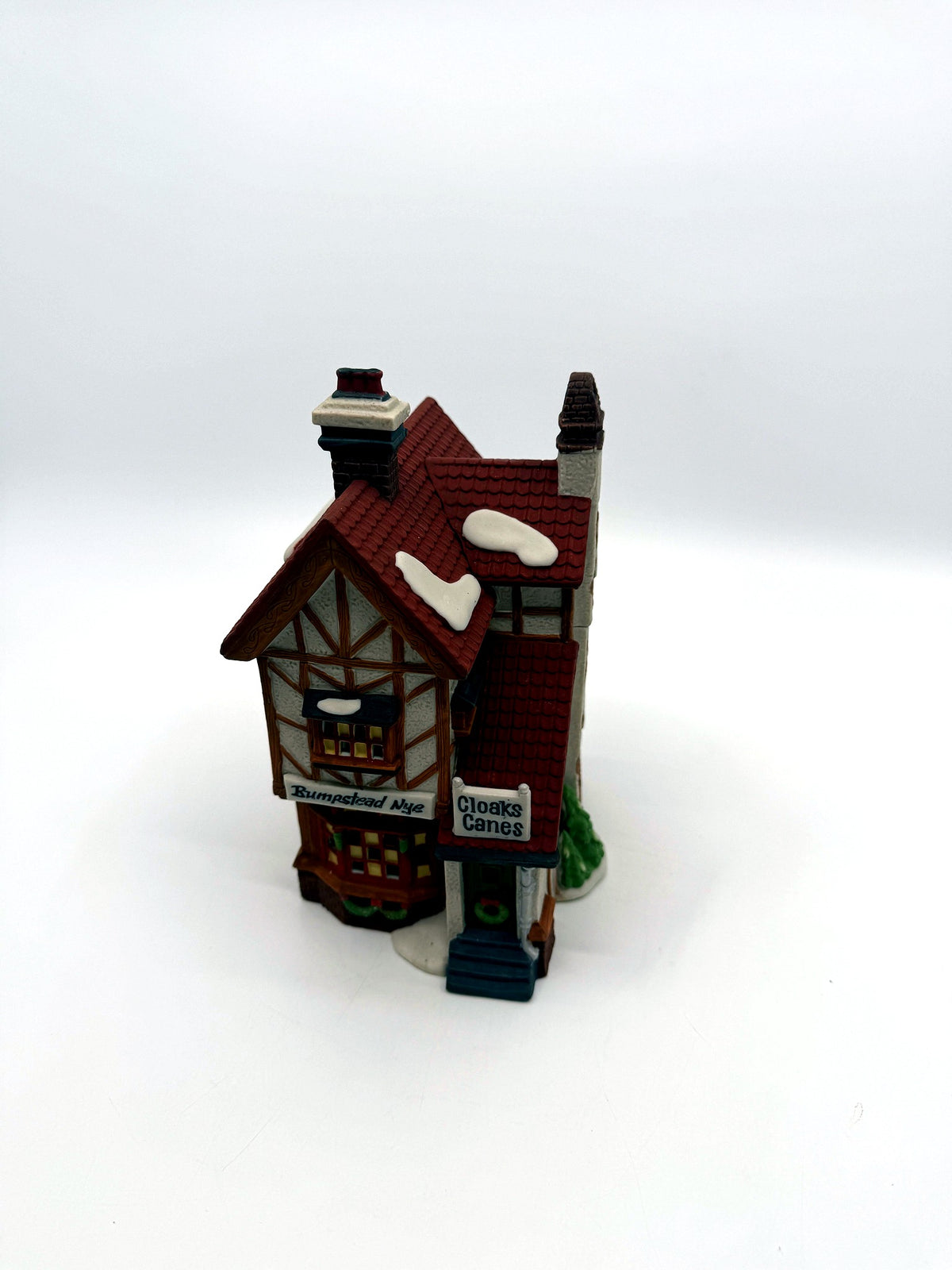 Front angle view with the Bumpstead Nye and Cloaks Canes shop signs