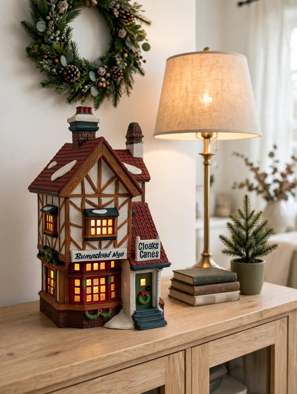 Styled lifestyle photo — Bumpstead Nye on a console table beside a lamp and books (display inspiration)