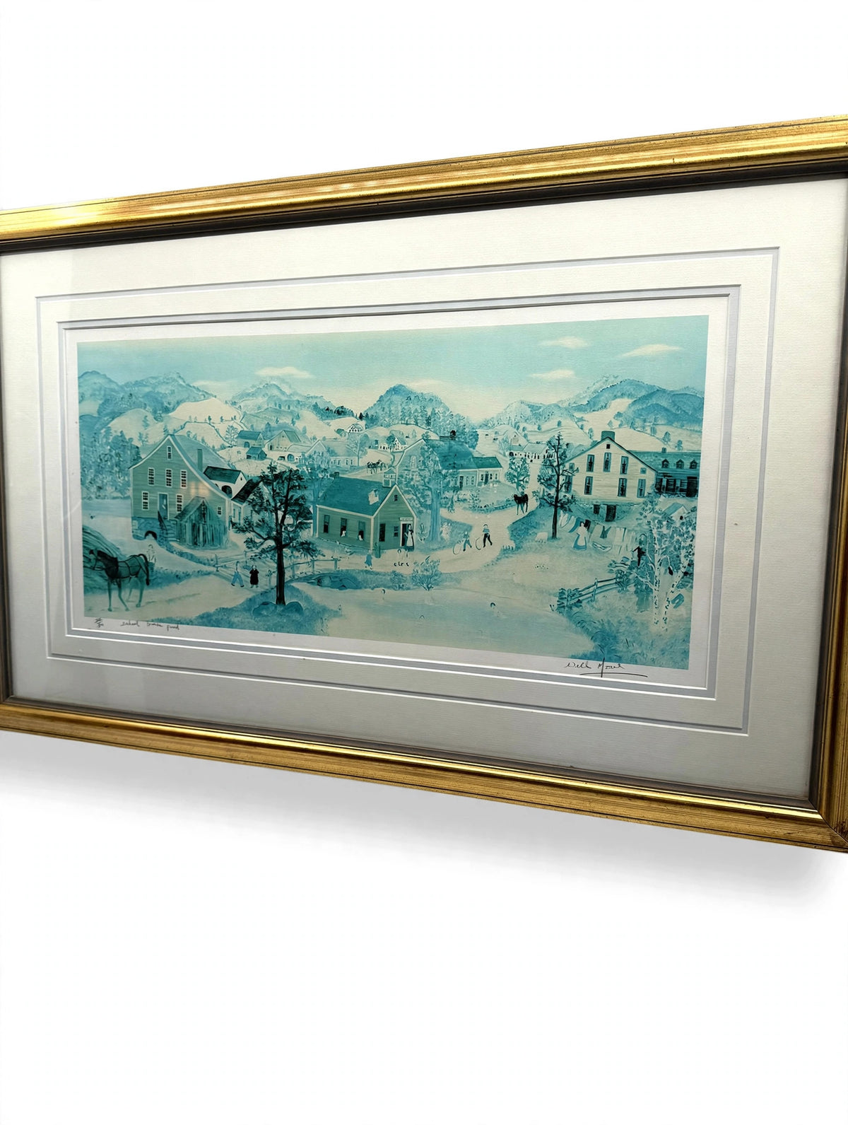 Will Moses "School House Pond" lithograph — angled front view from the right, showing the gold frame profile and the village scene
