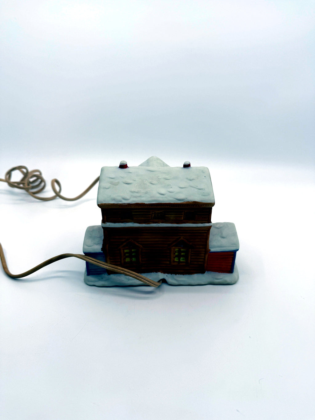 Lighted ceramic Christmas village country store, back view