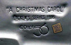 Close-up of the molded underside mark: A Christmas Carol, Dickens Series 1986, Department 56, Made in Philippines