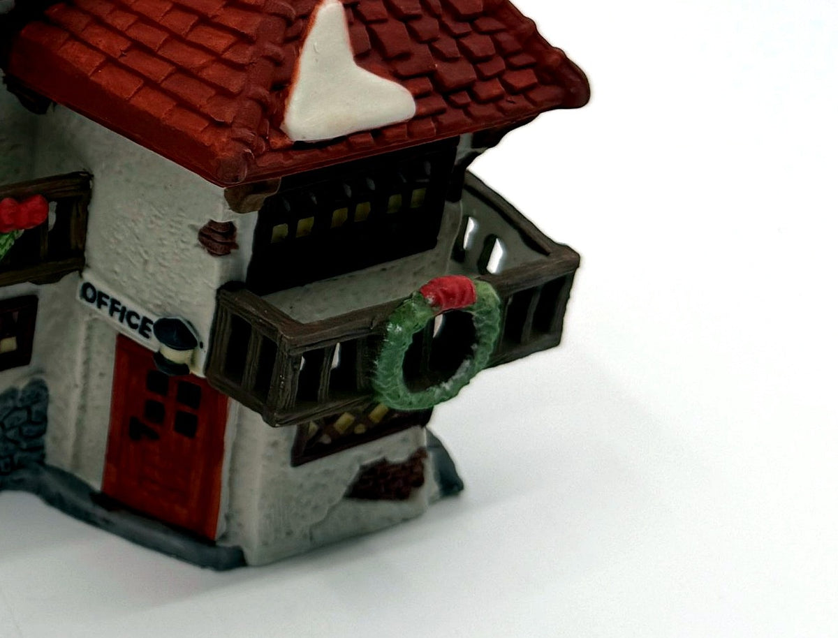 Department 56 Mr. Wickfield Solicitor, Dickens' Village, David Copperfield, 1989 – detail: office balcony with wreath and Office door