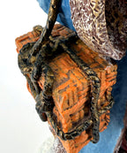 Detail crop — the woven basket’s texture and rope trim