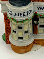 Detail - curved bay window and Geo Weeton sign