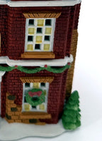 Department 56 Dickens' Village Boarding & Lodging School 1993 #5809-2 – 150th Anniversary of A Christmas Carol Commemorative Edition, No. 18 – detail of the hand-painted brickwork, windows and Christmas wreath