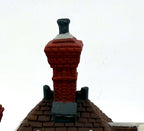 Wm. Wheat Cakes & Puddings #5808-7 — detail: tall brick chimney and shingled roof