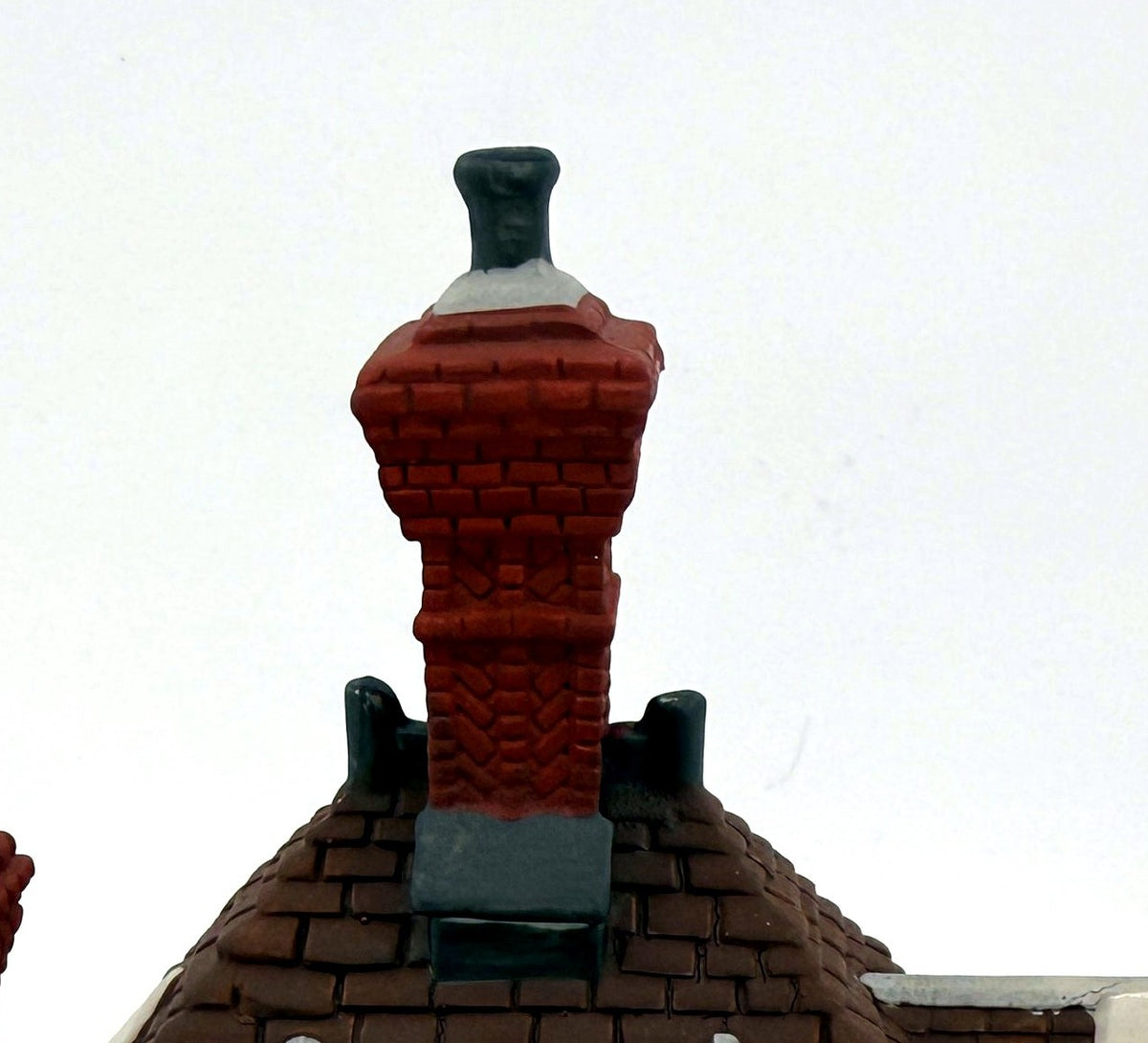 Wm. Wheat Cakes & Puddings #5808-7 — detail: tall brick chimney and shingled roof