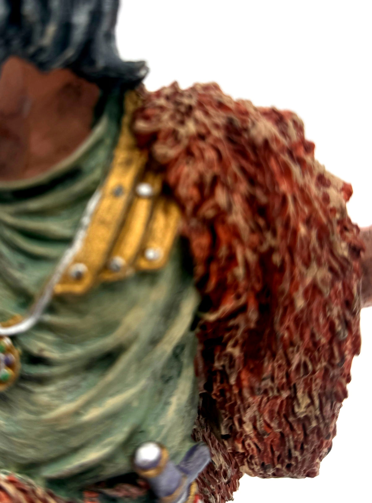 Detail: sculpted fur cloak texture and gold shoulder guard (detail from seller photo)