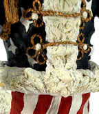 Detail close-up — gold frog closures with white toggles and textured off-white fur trim on the star-covered navy coat