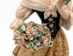 Giuseppe Armani Roses of May figurine 1405C — detail crop of the black laced corset and the rose bouquet at her waist