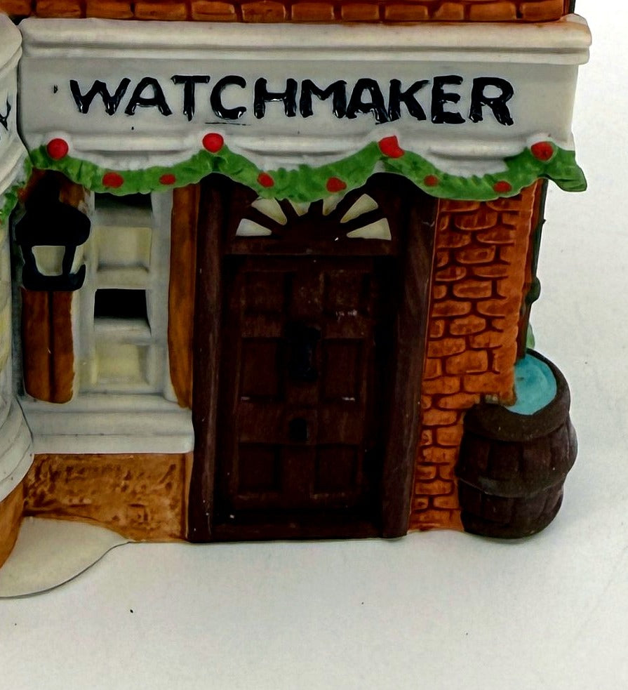 Detail - Watchmaker sign, garland and front door