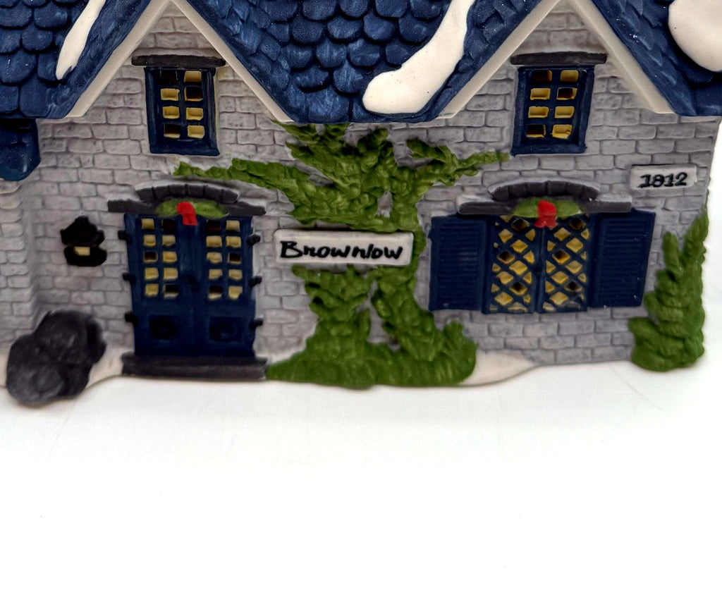 Detail crop — front double doors, Brownlow sign and climbing ivy