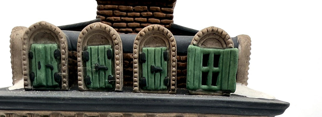 Detail: dormer windows with green shutters (detail from seller photo)