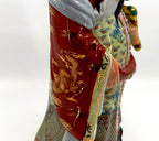 Vintage Chinese porcelain Lu Xing prosperity god statue, Taiwan — detail: gold dragon on the coral-red sleeve