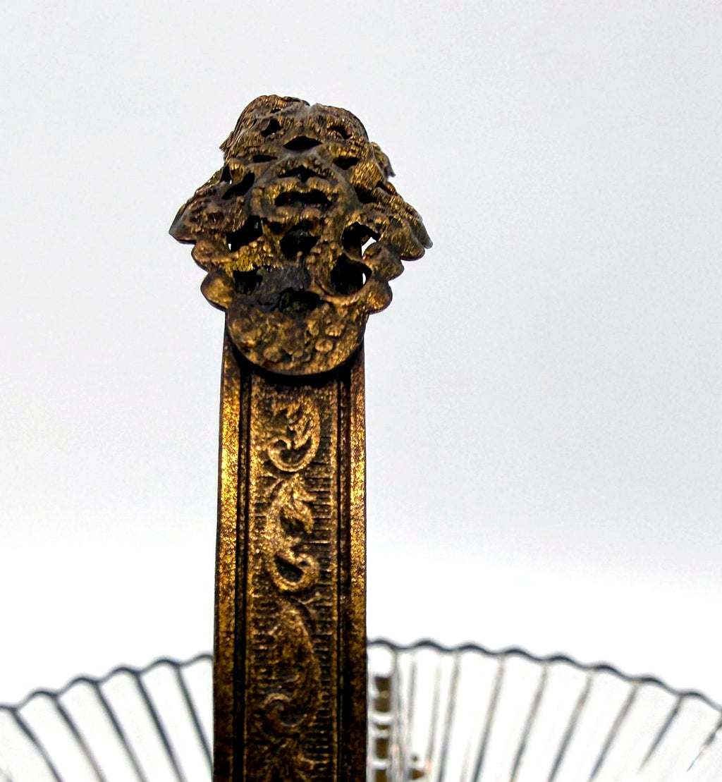 Detail: engraved handle scrollwork (detail from seller photo)