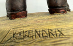 Vintage 1994 Duncan Royale Santa's Gift figurine – detail of the sculptor's signature 'Hendrix' incised on the base