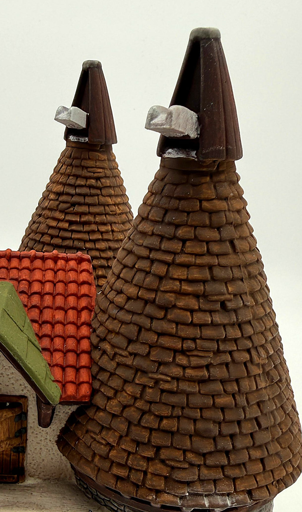 Detail of a conical oast kiln with shingled cone and cowl