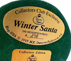 Detail crop — the gold base labels: Winter Santa, Collectors Club Exclusive, 2nd Redemption Piece, © 1993 M.E. Duncan, Fullerton CA