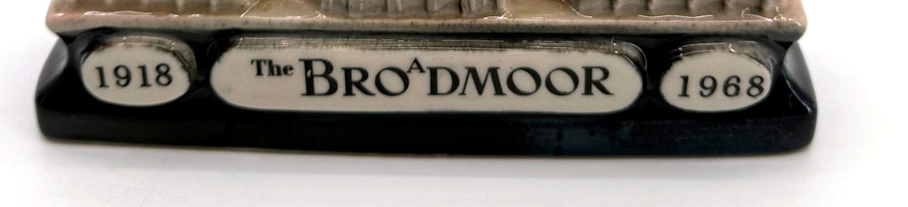 Detail crop of The Broadmoor name plaque with 1918 and 1968 anniversary dates
