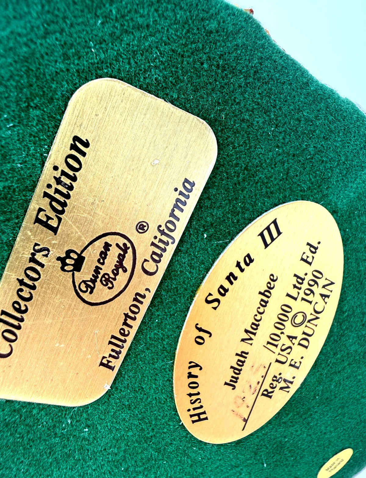Detail: Duncan Royale underside plaques, History of Santa III Judah Maccabee (detail from seller photo)