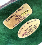 Detail close-up — underside plaques: Duncan Royale Collectors Edition, Fullerton California; History of Santa III, Star Man, hand-numbered 1925 of 10,000, © 1990, M. E. Duncan