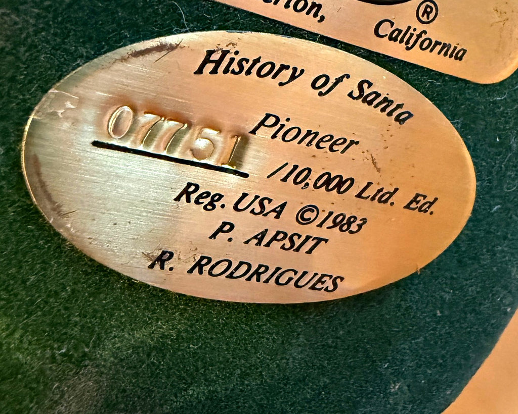 Vintage 1983 Duncan Royale Pioneer Santa figurine – detail of the underside plate: History of Santa, Pioneer, No. 07751 of 10,000, Reg. USA ©1983, P. Apsit, R. Rodrigues