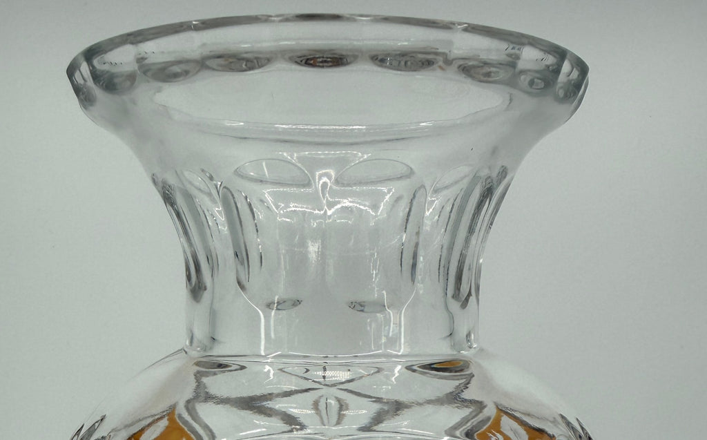 Detail: flared rim and thumbprint neck panels (detail from seller photo)